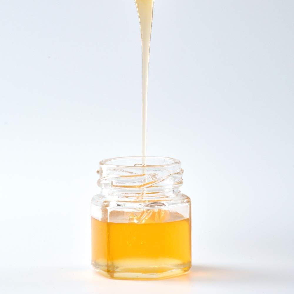 Sleek Functional Mini Glass Jars with Honeybee Pendants